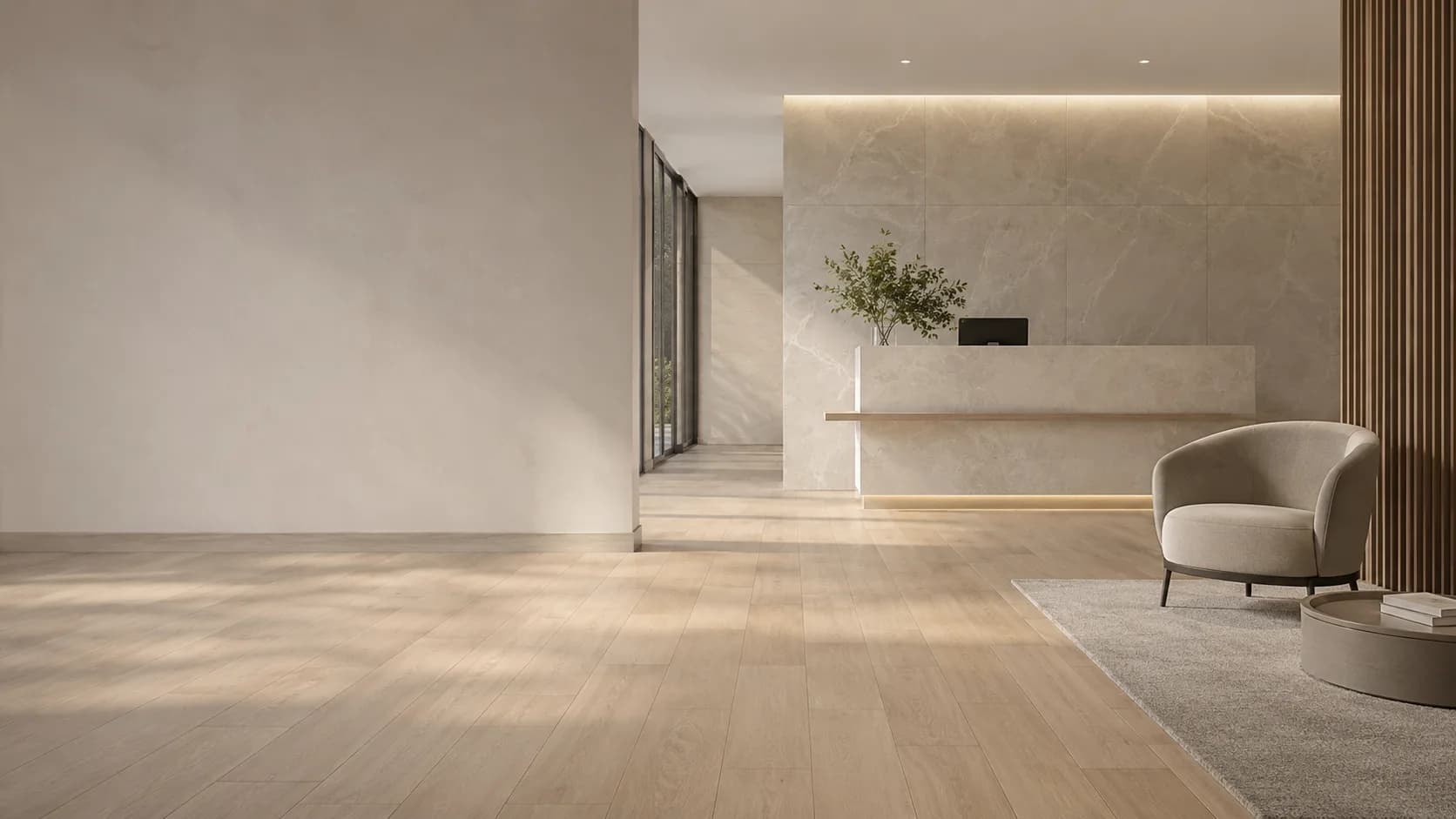 Modern Archerfield showroom lobby with light timber flooring, a stone reception desk, and marble-look wall tiles