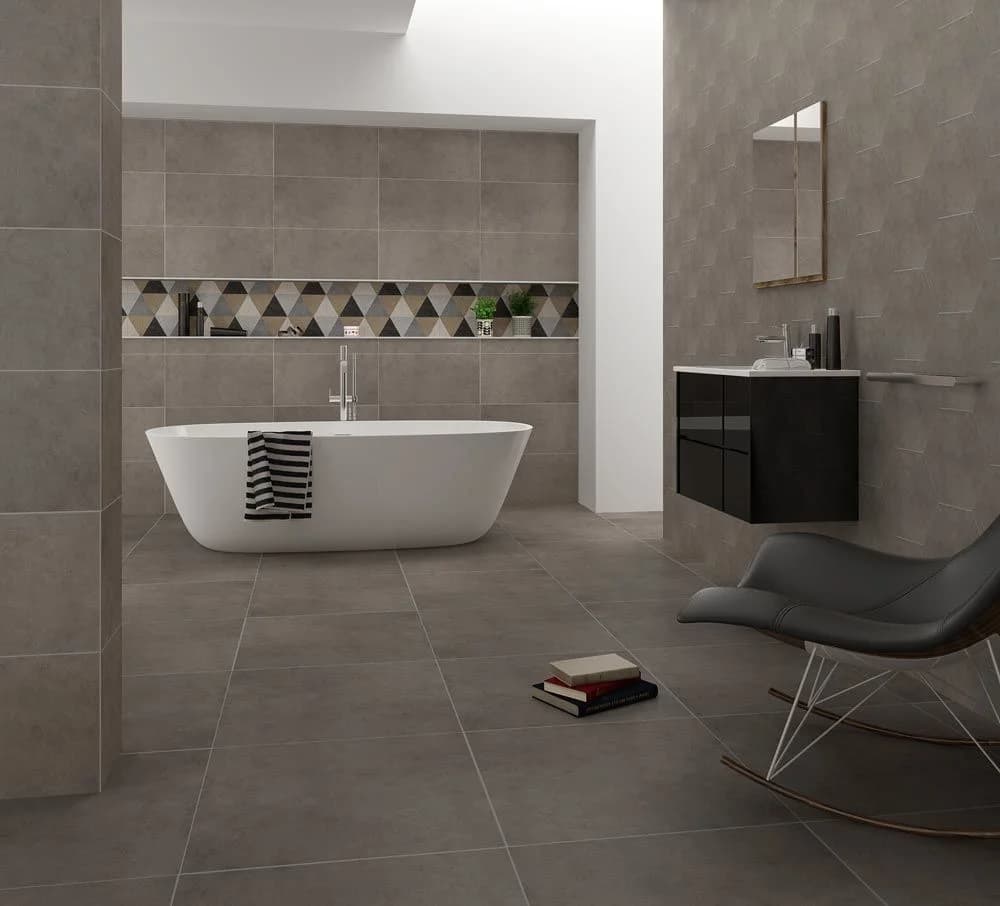 Neutral porcelain and ceramic tiles in a contemporary architectural interior.