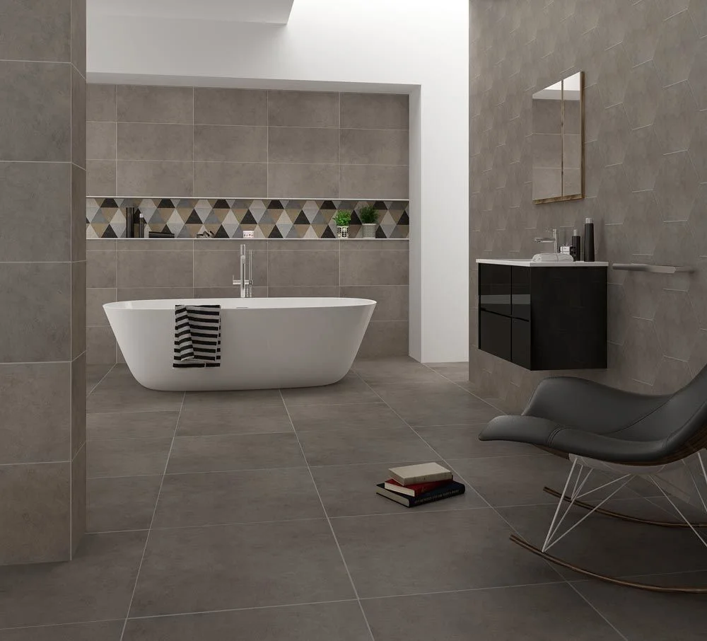 Neutral porcelain and ceramic tiles in a contemporary architectural interior.